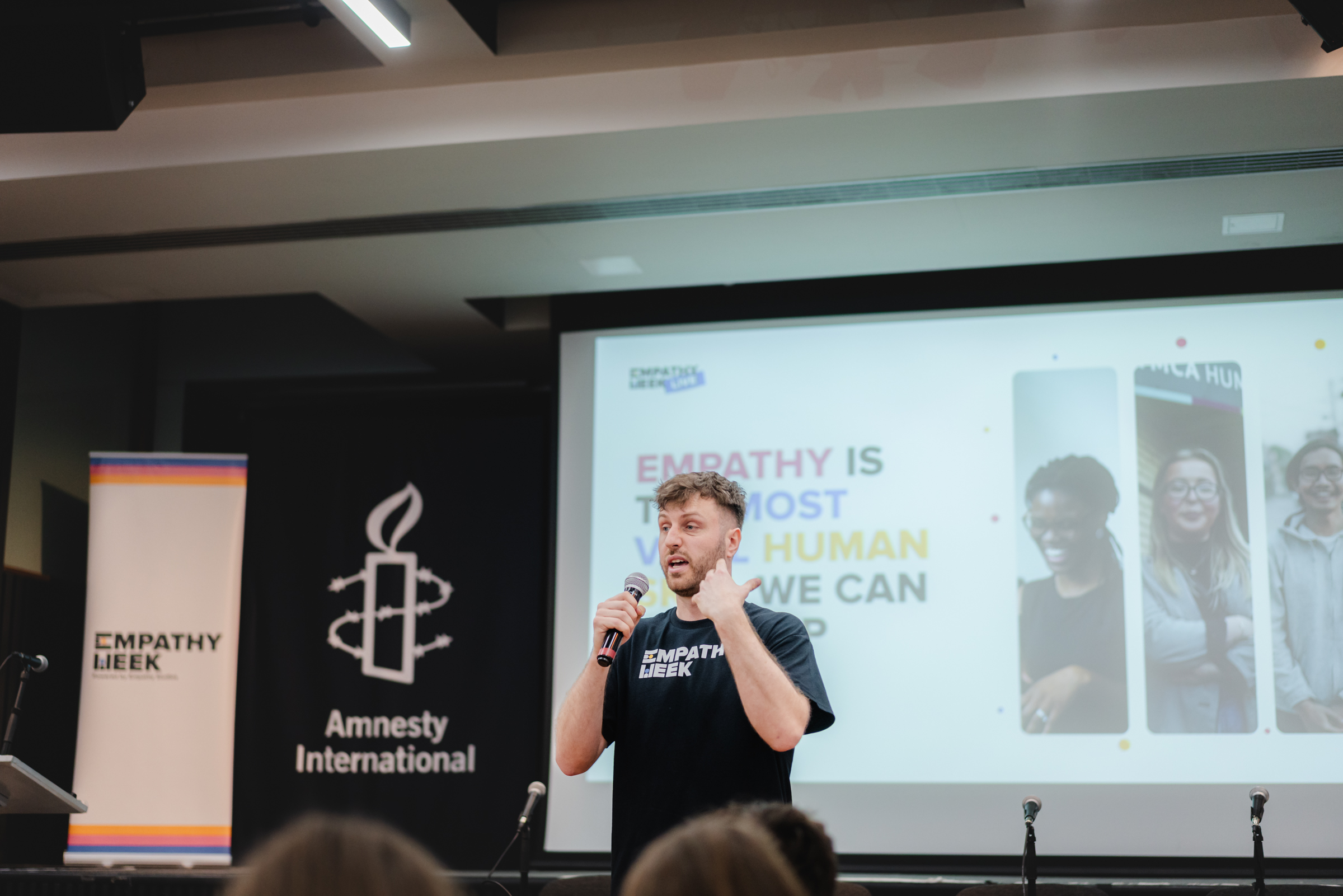 Ed, founder of Empathy Week and Teach First ambassador, speaking on stage at an Empathy Week event