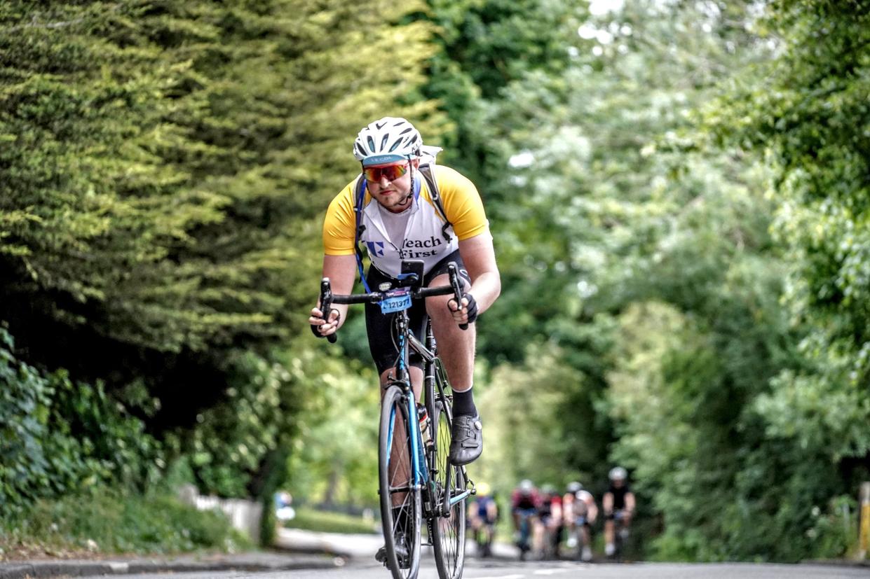 Cyclist in Teach First cycling jersey 
