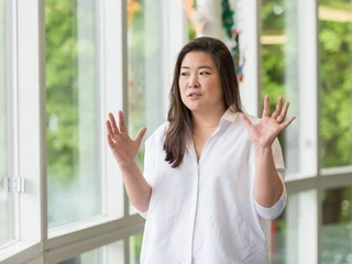 A Teach First trainee explaining something.