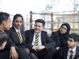 Pupils sit and talk