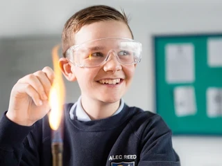 Student with bunsen burner