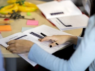 A teacher marks grades