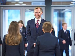 Mat Galvin, Headteacher of The Macclesfield Academy speaks with pupils