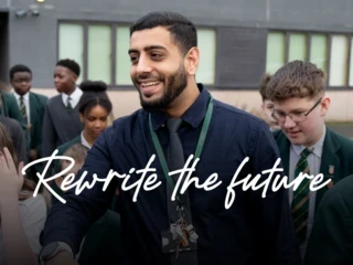 Teacher greeting secondary school pupils outdoors during Teach First's Rewrite the Future campaign.