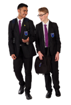 Two pupils walking alongside one another and talking.