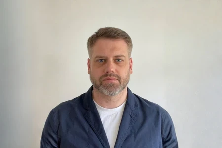 Headshot of Ben Aston