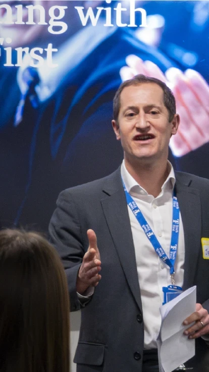 James Toop, CEO of Teach First, speaking at an event.